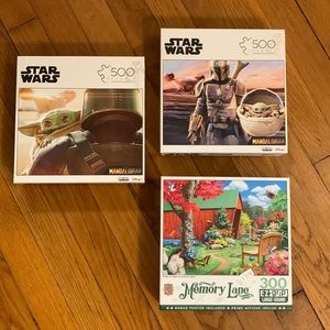 3 puzzles. 2Star Wars w 500 pieces and one NEW Memory Lane w 300 pieces & poster